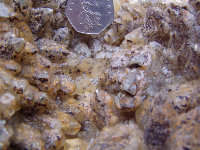 C a l c i t e   w i t h   C h a l c o p y r i t e   i n c l u s i o n s   c l o s e u p   